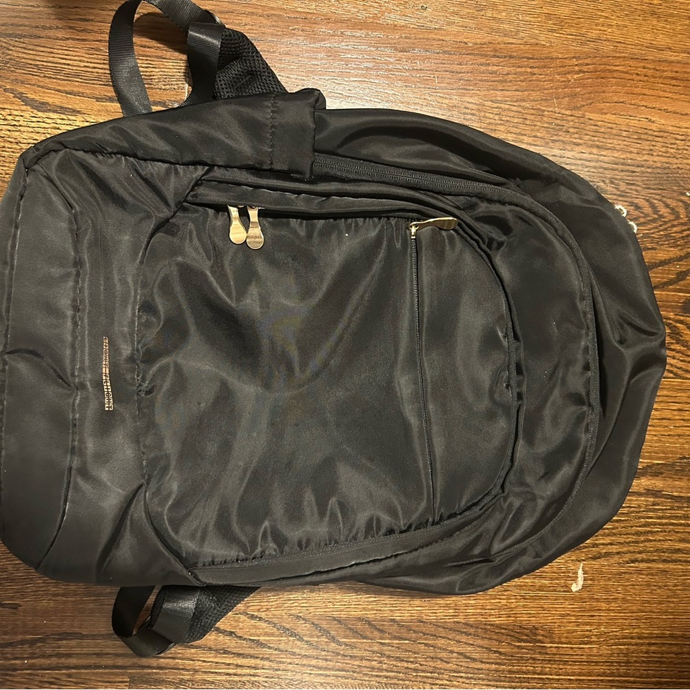 Black Backpack with Durable Fabric and Water-Resistant Sheen (LIGHT FLIGHT)